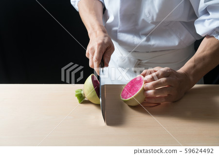In front of board cutting red radish In front of board cutting red radish 59624492