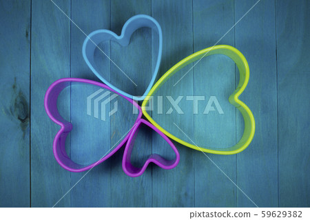 Heart-shaped figures on blue background 59629382