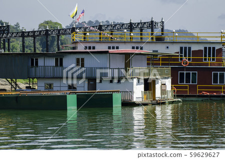 boathouse floating near the lakeshore. boathouse floating near the lakeshore. 59629627