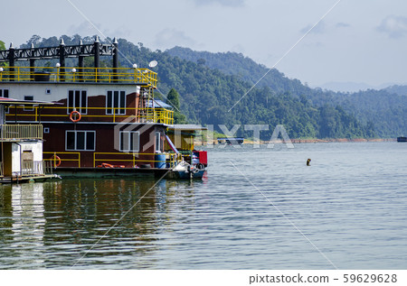 boathouse floating near the lakeshore. 59629628