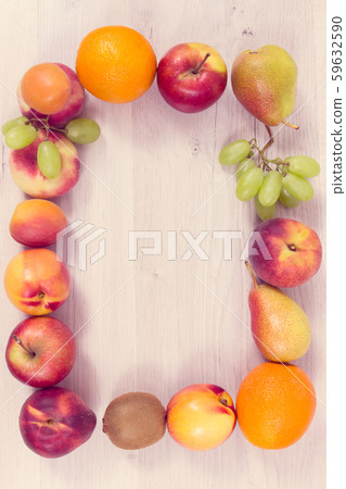 Frame of nutritious fruits as healthy dessert 59632590