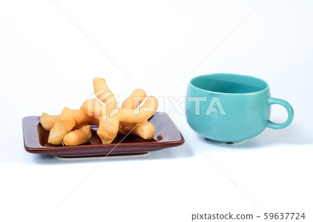 Fried bread traditional food on dish with coffee Fried bread traditional food on dish with coffee 59637724