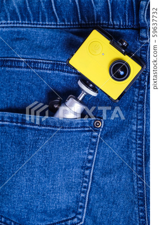 Action camera in trouser jean pocket For travel. Action camera in trouser jean pocket For travel. 59637732