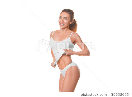 Happy smiling woman showing her waist. Isolated on white. 59638665