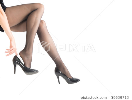Female legs with injured heels by tight classic black high heels, isolated on white. Woman suffering Female legs with injured heels by tight classic black high heels, isolated on white. Woman suffering 59639713