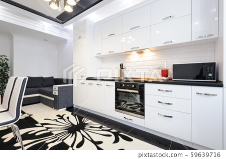 Luxury modern black and white kitchen interior Luxury modern black and white kitchen interior 59639716