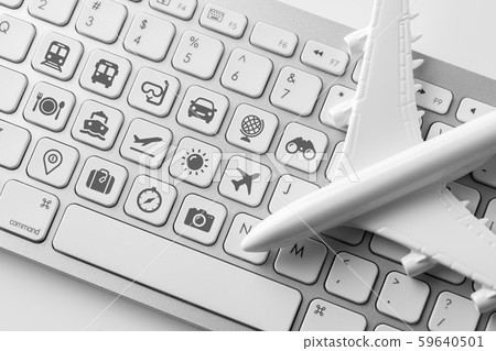 Travel icon on computer keyboard for online Travel icon on computer keyboard for online 59640501