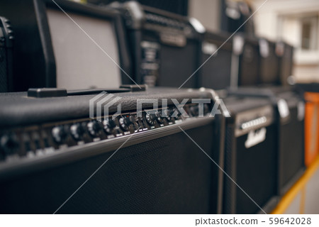 Sound combo amplifiers on showcase in music store Sound combo amplifiers on showcase in music store 59642028