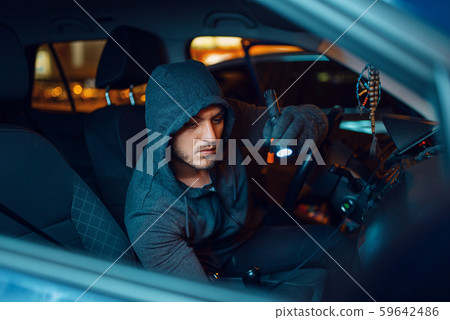Professional car thief with flashlight, Professional car thief with flashlight, 59642486