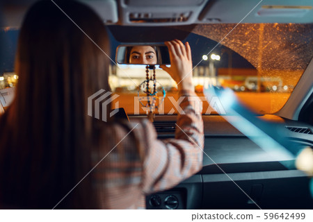 Female driver at the night, car burglar risk 59642499