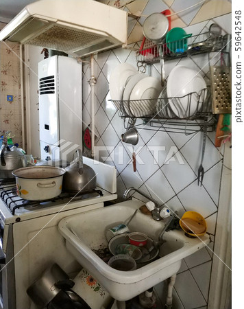 mess and dump. An old room with lots of things. 59642548
