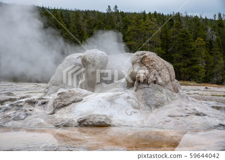Geothermal feature at old faithful area at Geothermal feature at old faithful area at 59644042