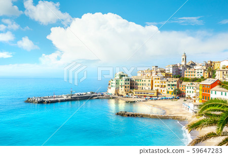 View of Bogliasco. Bogliasco is a ancient fishing village in Italy, Genoa, Liguria. Mediterranean Sea, sandy beach and architecture of Bogliasco town. View of Bogliasco. Bogliasco is a ancient fishing village in Italy, Genoa, Liguria. Mediterranean Sea, sandy beach and architecture of Bogliasco town. 59647283