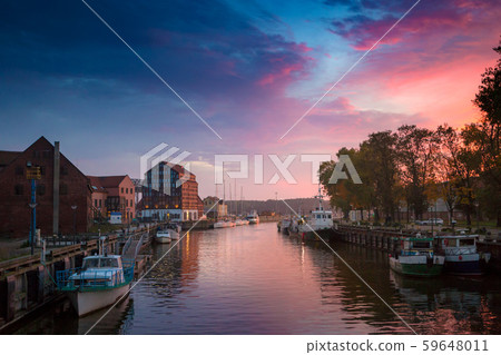 Sunset in the Klaipeda port, Lithuania. 59648011