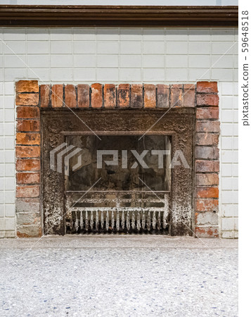 An old brick stove in a village house. 59648518