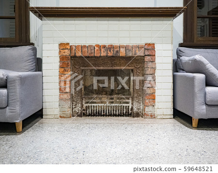 An old brick stove in a village house. 59648521