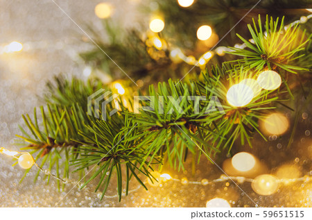 Decorated Christmas tree on silver blurred background Decorated Christmas tree on silver blurred background 59651515
