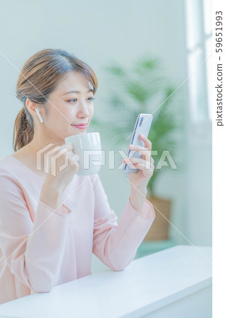 Young woman smartphone earphone Young woman smartphone earphone 59651993