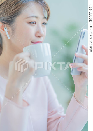 Young woman smartphone earphone Young woman smartphone earphone 59651994