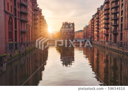 Historical famous warehouse district at sunset golden ray light located in Hamburg city old port 59654810