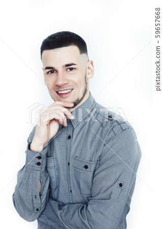 young handsome well groomed guy posing on white background gesturing smiling, lifestyle people young handsome well groomed guy posing on white background gesturing smiling, lifestyle people 59657668