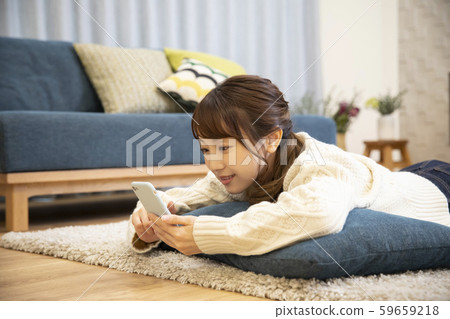 Ladies knit lie down smartphone smartphone mobile phone Ladies knit lie down smartphone smartphone mobile phone 59659218