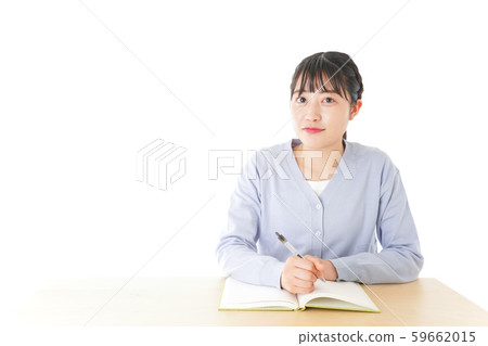 Young female student taking classes Young female student taking classes 59662015