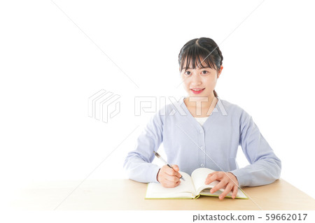 Young female student taking classes Young female student taking classes 59662017