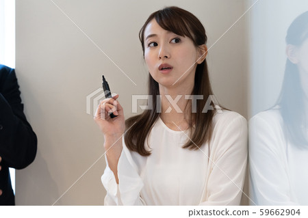 Female meeting whiteboard Female meeting whiteboard 59662904