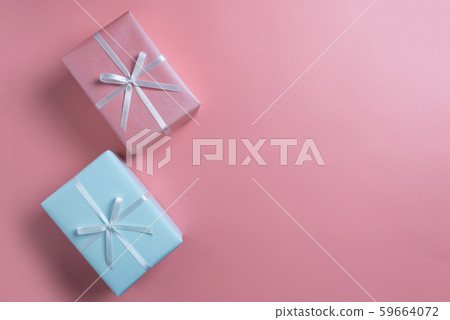 Top view of blue and pink gift boxes on color Top view of blue and pink gift boxes on color 59664072