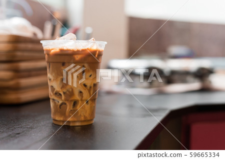 ice latte coffee in plastic glass ice latte coffee in plastic glass 59665334
