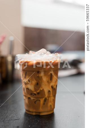 ice latte coffee in plastic glass ice latte coffee in plastic glass 59665337