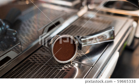 Coffee powder on coffee tamper Coffee powder on coffee tamper 59665338