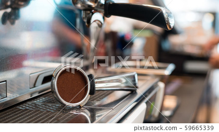 Coffee powder on coffee tamper Coffee powder on coffee tamper 59665339