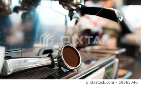 Coffee powder on coffee tamper Coffee powder on coffee tamper 59665340