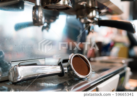 Coffee powder on coffee tamper Coffee powder on coffee tamper 59665341