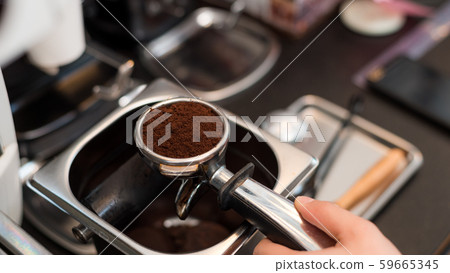 Coffee powder on coffee tamper 59665345
