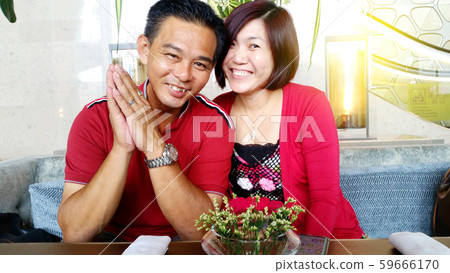 Asian middle age couple Asian middle age couple 59666170