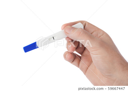 Hand with pregnancy test Hand with pregnancy test 59667447
