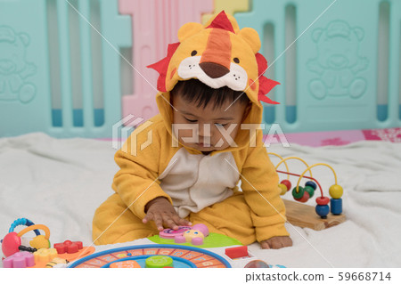 Cute asian boy play toy in room 59668714