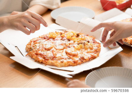 Family picking up pizza Family picking up pizza 59670386