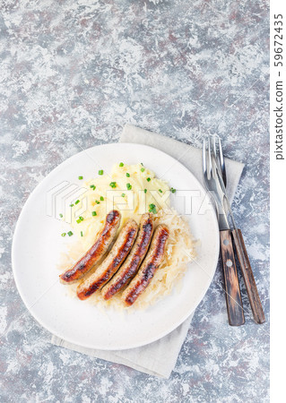 Roasted nuremberg sausages Roasted nuremberg sausages 59672435