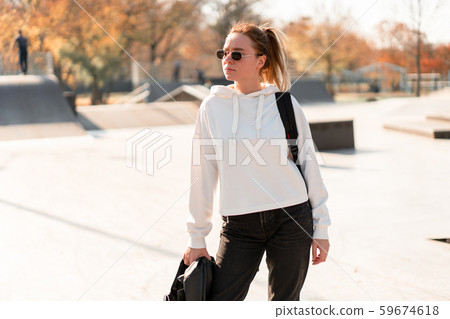 Outdoor portrait of young beautiful woman with a Outdoor portrait of young beautiful woman with a 59674618