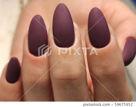 Gray striped nail design on female hand close up. Gray striped nail design on female hand close up. 59675952