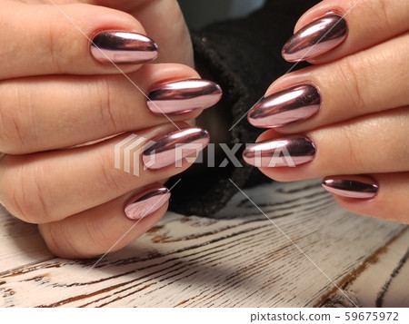 Gray striped nail design on female hand close up. 59675972