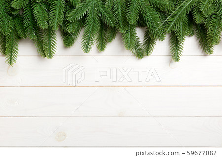 Top view of fir tree on wooden background. 59677082