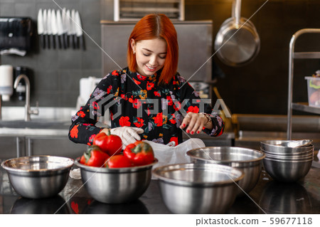 Beautiful young red-haired girl in evening dress Beautiful young red-haired girl in evening dress 59677118