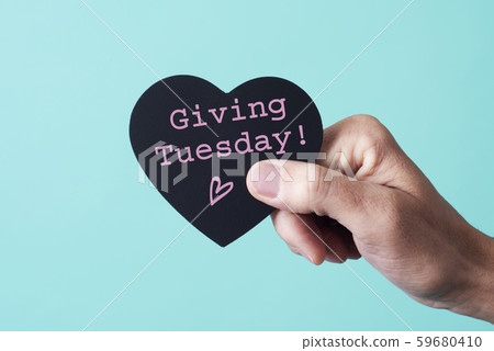 text giving tuesday in a heart-shaped sign 59680410