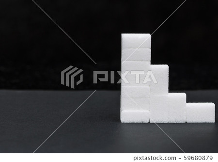 white sugar cubes stacked in a pyramid, sugar 59680879