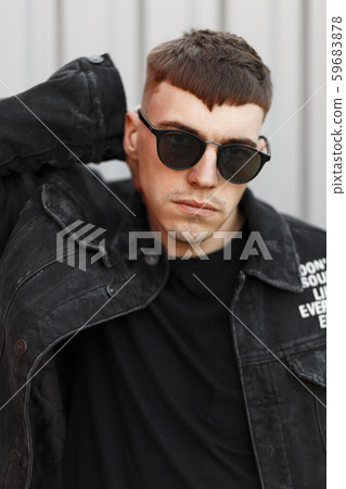 Handsome young man American model with a hairstyle 59683878